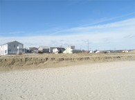 Sea Bright, NJ — January 2013. A previously-funded beach replenishment project is underway, even though the infrastructure and services that previously served the beach have been seriously compromised. Image courtesy Carlos Rodrigues.