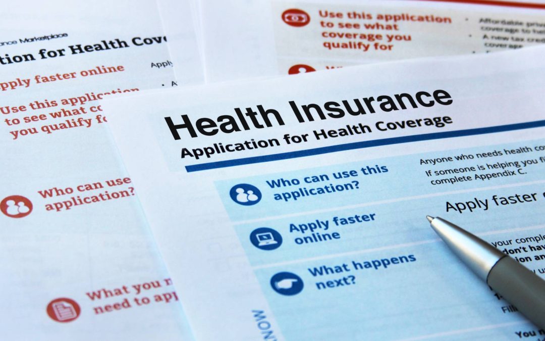 Winecoff: Working Paper on Health Insurance Enrollment