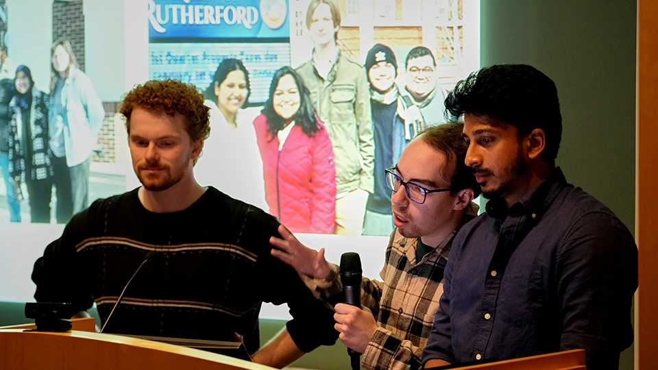 Bloustein School graduate students (l-r) Zachary Soricelli, Andrew Zuppardi, and Abdul Kalam Mustaq present Advance Climate Resilience Through Municipal Land Use Planning Graduate Studio at 2026 Bloustein Studio Day.